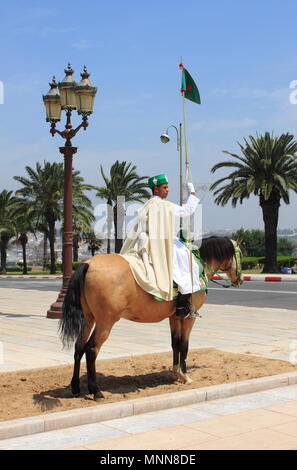 Rabat, Morocco - May 13, 2013: Royal guard in entry of mausoleum Mohammed V (Mohamed Ben Yusef) and Hassan II. Mausoleum contains tombs of Kings Moham Stock Photo