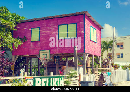 Caye Caulker, Belize - December 20, 2016: View at the colorful wooden house in Caye Caulker. It is a small island near Ambergris Caye, Belize. Stock Photo