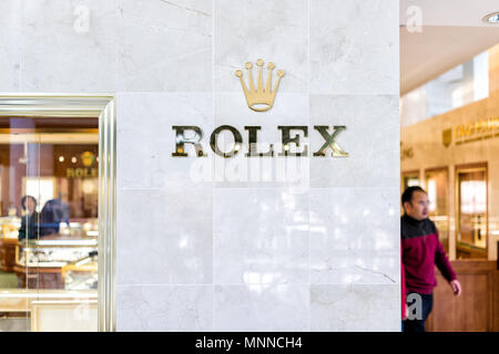 Tysons, USA - January 26, 2018: Rolex closeup store sign entrance watch time shopping in Tyson's Corner Mall in Fairfax, Virginia by Mclean Stock Photo