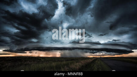Supercell storm clouds with wall cloud and intense rain Stock Photo - Alamy