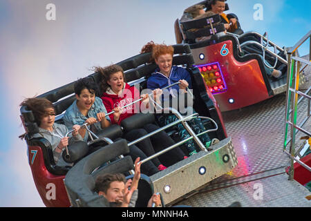 Excitement on fairground ride at Stokesley Show, North Yorkshire, England, UK Stock Photo