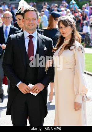 Patrick J. Adams and wife Troian Bellisario arrive at St George's Chapel at Windsor Castle for the wedding of Meghan Markle and Prince Harry. Stock Photo