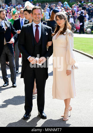 Patrick J. Adams and wife Troian Bellisario arrive at St George's Chapel at Windsor Castle for the wedding of Meghan Markle and Prince Harry. Stock Photo