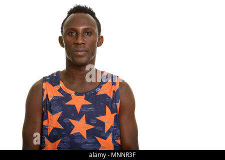 Man wearing white sleeveless shirt on 