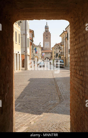 The entrance door next to the western gate into the historical centre of Castelfranco Veneto. In the background on of the Medieval towers. Stock Photo