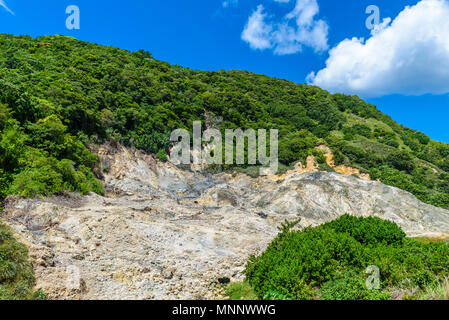 View of Drive-In Volcano Sulphur Springs on the Caribbean island of St. Lucia. La Soufriere Volcano is the only drive-in volcano in the world. Stock Photo