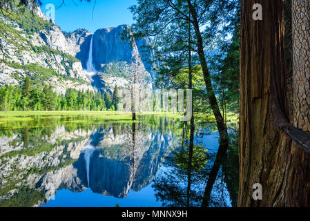 Yosemite National Park - Reflection in Merced River of Yosemite waterfalls and beautiful mountain landscape, California, USA Stock Photo