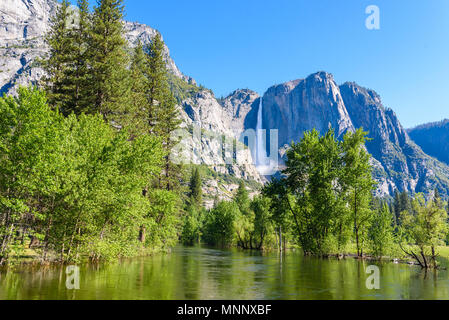 Yosemite National Park - Reflection in Merced River of Yosemite waterfalls and beautiful mountain landscape, California, USA Stock Photo