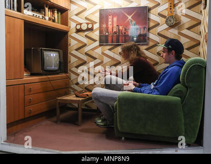 Berlin, Germany. 18th May, 2018. People visit the Computer Games Museum Berlin, in Berlin, capital of Germany, on May 18, 2018. The Computer Games Museum Berlin, which was founded in 1997, displays more than 300 exhibits to allow visitors to experience the development of computer games in decades. Credit: Shan Yuqi/Xinhua/Alamy Live News Stock Photo