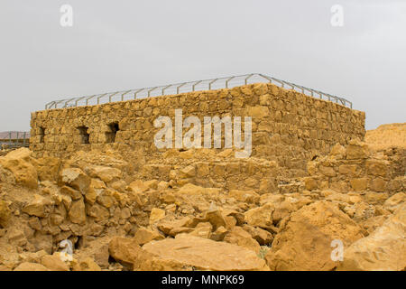 Some of the reconstructed ruins of the ancient Jewish clifftop fortress of Masada in Southern Israel.  This was the scene of an historic mass suicide. Stock Photo