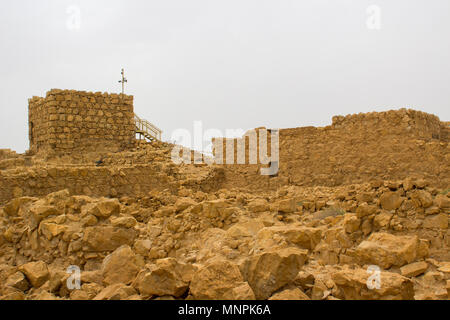 Some of the reconstructed ruins of the ancient Jewish clifftop fortress of Masada in Southern Israel.  This was the scene of an historic mass suicide. Stock Photo