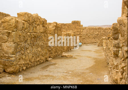 Some of the reconstructed ruins of the ancient Jewish clifftop fortress of Masada in Southern Israel.  This was the scene of an historic mass suicide. Stock Photo