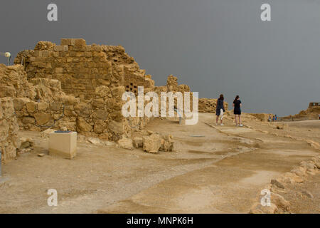 Some of the reconstructed ruins of the ancient Jewish clifftop fortress of Masada in Southern Israel.  This was the scene of an historic mass suicide. Stock Photo