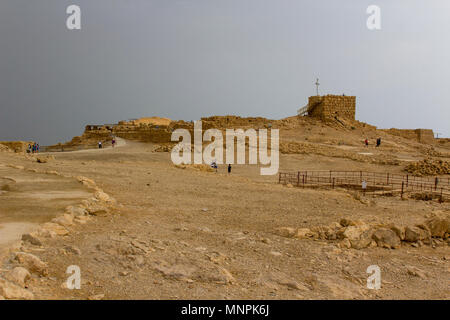 Some of the reconstructed ruins of the ancient Jewish clifftop fortress of Masada in Southern Israel.  This was the scene of an historic mass suicide. Stock Photo