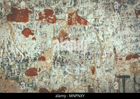 Tekstura old wall of white plaster with scratches. Processing in retro style or vintage for design and creativity.Cracked and decayed brick stucco wal Stock Photo