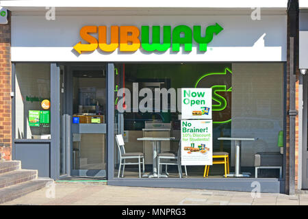 Just opened new franchise branch with new Subway brand logo over fast food restaurant & sandwich shop front window in shopping street Essex England UK Stock Photo