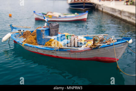 Small fishing boat in the harbour of Fiskardo on the ionian island Kefalonia in Greece Stock Photo