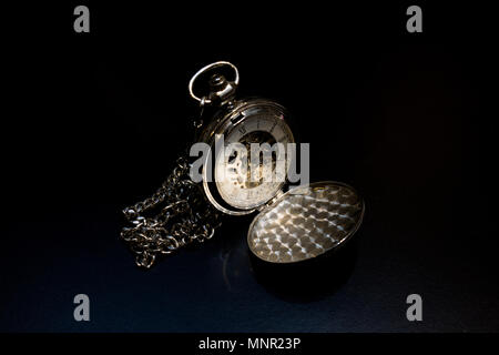 Pocket watch on black background Stock Photo