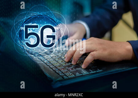 phone computer 5g Earth businessman connect worldwide waiter hand holding an empty digital tablet with smart and 5G network connection concept Stock Photo