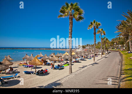 TENERIFE, SPAIN-SEPTEMBER 17:Beach Playa de la Vistas  on September 17, 2011Tenerife,Spain. More than 5 million tourists from UK visit Tenerife every  Stock Photo