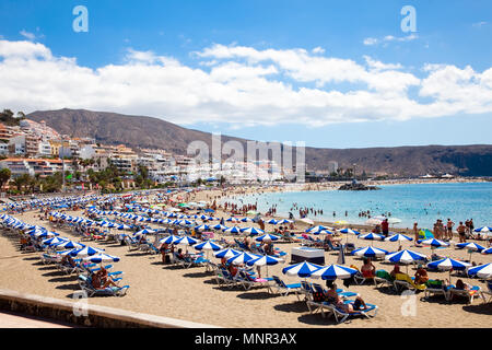 TENERIFE, SPAIN-SEPTEMBER 17:Beach Playa los Cristianos on September 17, 2011Tenerife,Spain. More than 5 million tourists from UK visit Tenerife every Stock Photo
