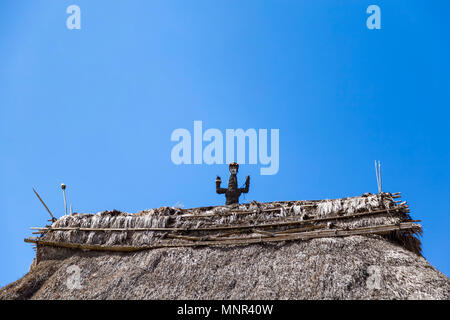 Ceremonial sculpture on the top of a house in the Bena traditional village in Flores, Indonesia. Stock Photo