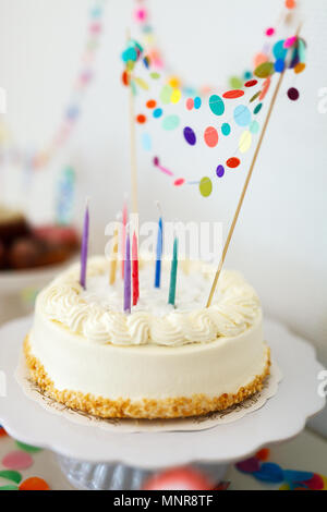 Close up of a delicious birthday cake decorated with colorful confetti Stock Photo
