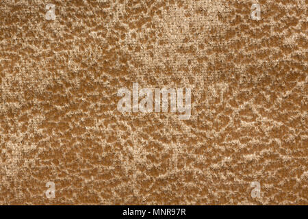 Stylish mottled fabric texture in admirable brown tone. Stock Photo