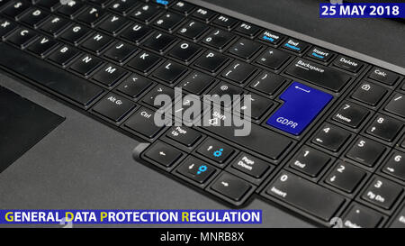 blue keyboard key with text GDPR as symbol for Privacy and General Data Protection Regulation on a notebook computer Stock Photo