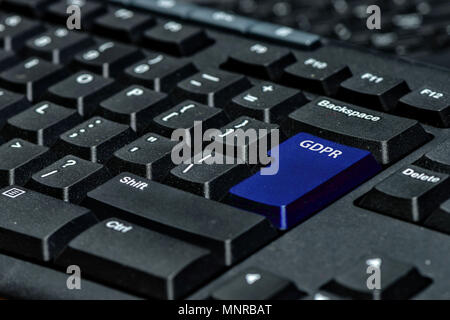blue keyboard key with text GDPR as symbol for Privacy and General Data Protection Regulation on a notebook computer Stock Photo