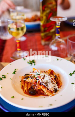 Delicious penne pasta served for lunch at luxury resort or restaurant Stock Photo