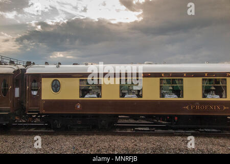 Pullman carriages  being pulled by a steam locomotive in Central London Stock Photo