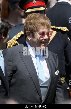 Sir Elton John leaves St George's Chapel at Windsor Castle after the wedding of Meghan Markle and Prince Harry. Stock Photo