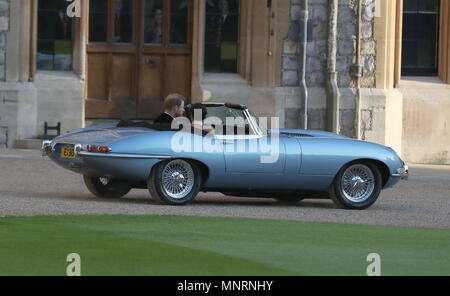 The newly married Duke and Duchess of Sussex, Meghan Markle and Prince Harry, leaving Windsor Castle after their wedding to attend an evening reception at Frogmore House, hosted by the Prince of Wales. Stock Photo