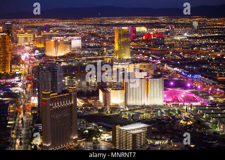 LAS VEGAS - MAY 15, 2018: Beautiful cityscape aerial view across Las Vegas Nevada at night with lights and many luxury resort hotels and casinos in vi Stock Photo