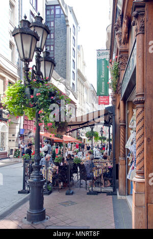 Sidewalk Cafe (Sorforra's Etterem) on Vaci Street, Budapest, Hungary. Váci utca (Váci street) is one of the main pedestrian thoroughfares. Stock Photo