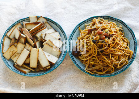 A plate of cold noodle and dried bean curd, Chinese cuisine Stock Photo