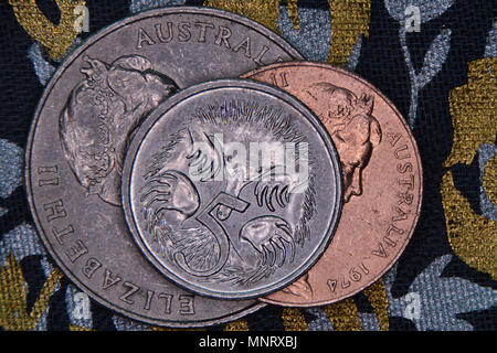 Finance pyramid - Australian coins stacked on each other. Five cent coin on top. Stock Photo