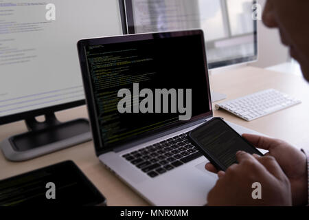 Programmer working Developing programming technologies Web Design Online Technology Stock Photo