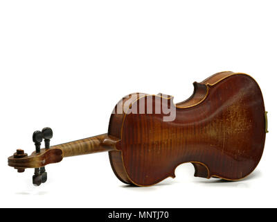 Back of an old scratched wooden violin isolated on white background Stock Photo