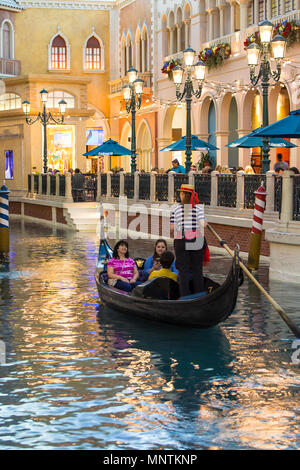 LAS VEGAS, NEVADA - MAY 15, 2018: View along the Grand Canal at the beautiful Venetian resort hotel casino in Las Vegas Nevada restaurants and people. Stock Photo