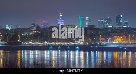 Old Town and river Vistula at night in Warsaw, Poland. Stock Photo