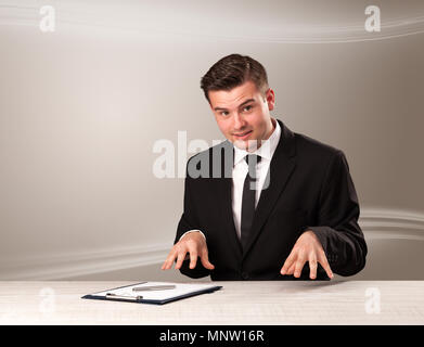 Televison presenter host in live show with blank background Stock Photo