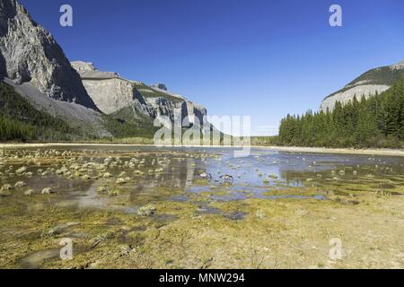 Springtime Landscape view of Scenic Second Ghost Lake and Rocky Mountains near East Boundary of Banff National Park, Alberta Canada Stock Photo