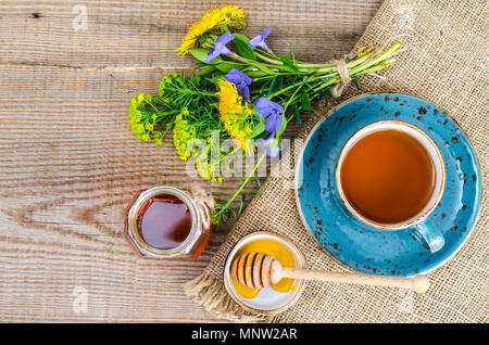 Fresh fragrant tasty honey from wild plants. Studio Photo Stock Photo