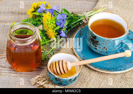 Fresh fragrant tasty honey from wild plants. Studio Photo Stock Photo