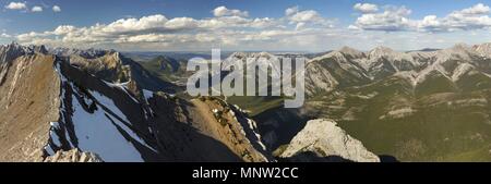 Canadian Rocky Mountains Wide Panoramic Landscape and distant Alberta Foothills from Wasootch Peak in Kananaskis Country near Banff National Park Stock Photo