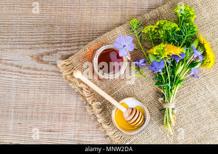 Fresh fragrant tasty honey from wild plants. Studio Photo Stock Photo