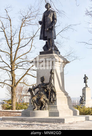 Statue of Sir John A. Macdonald on Parliament Hill by Louis-Philippe Hébert: Canada's first prime minister stands on a plinth with a bronze Britannia below. In the background a statue of George Brown, also a father of confederation. Stock Photo