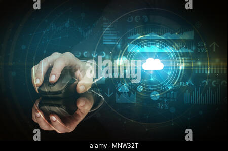 Hand using wireless mouse with cloud technology concept and dark background Stock Photo